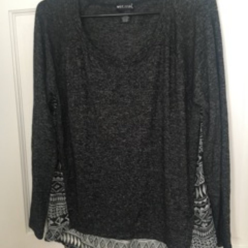 Wet Seal Top.  Front is a black marble type look, with sheer design of zig zag
